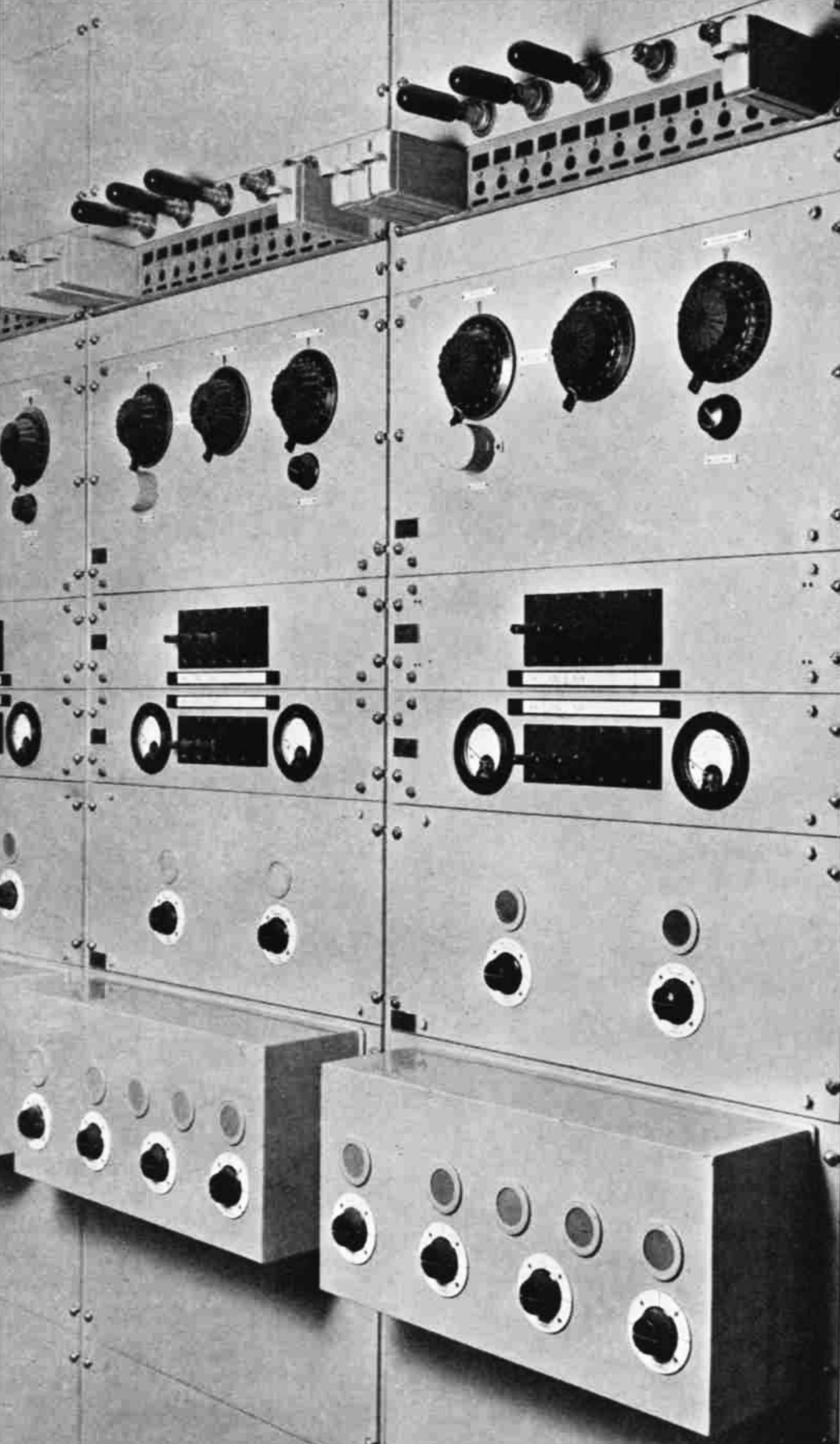 2 banks of equipment with dials and control knobs