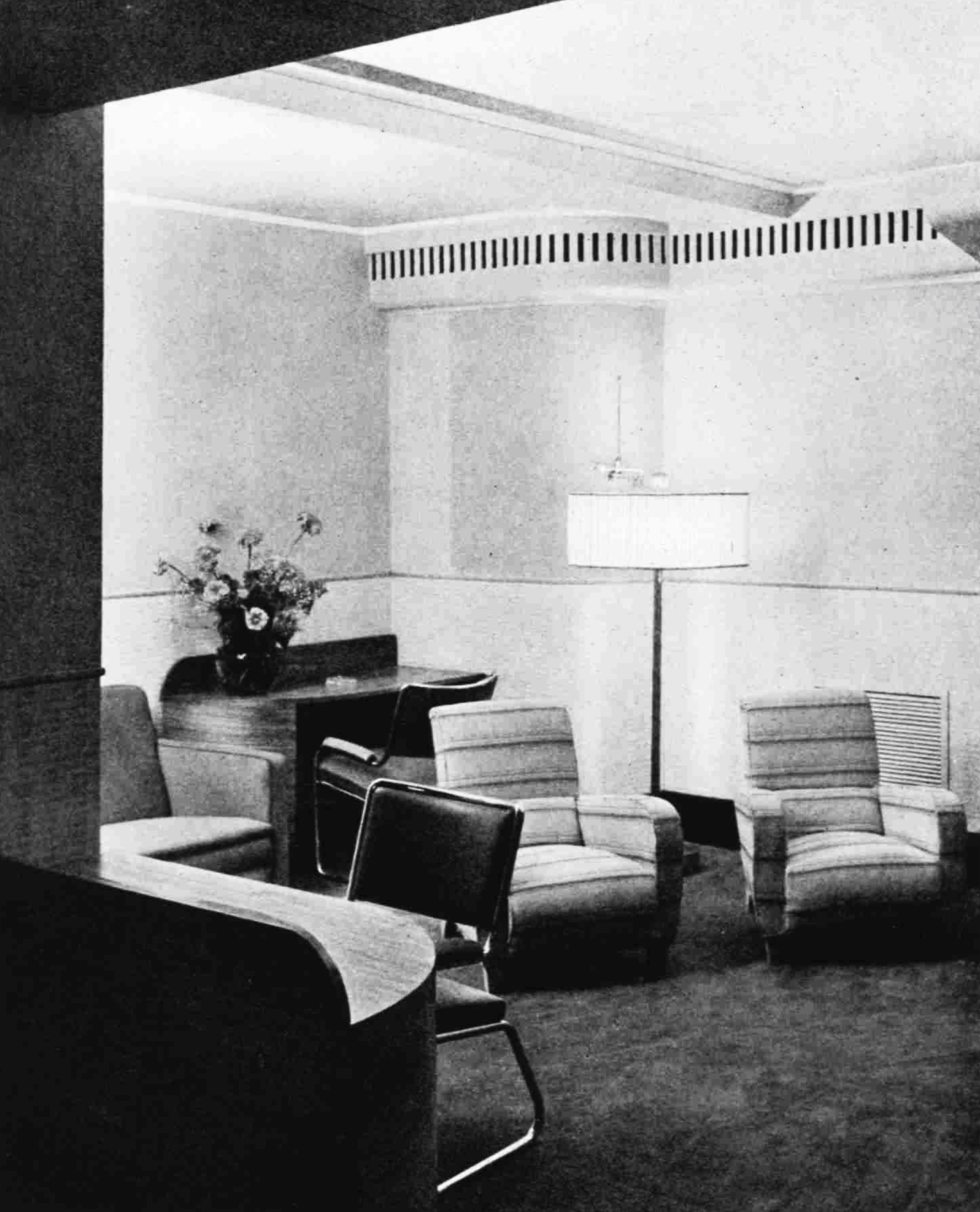 Comfortable chairs and a standard lamp